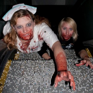 Zombies crawling up escalator
